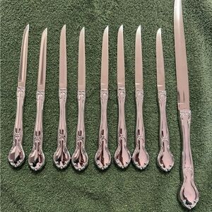 Vintage Carvel Hall stainless USA knives- set of 8 (8”) and 1 (13”)